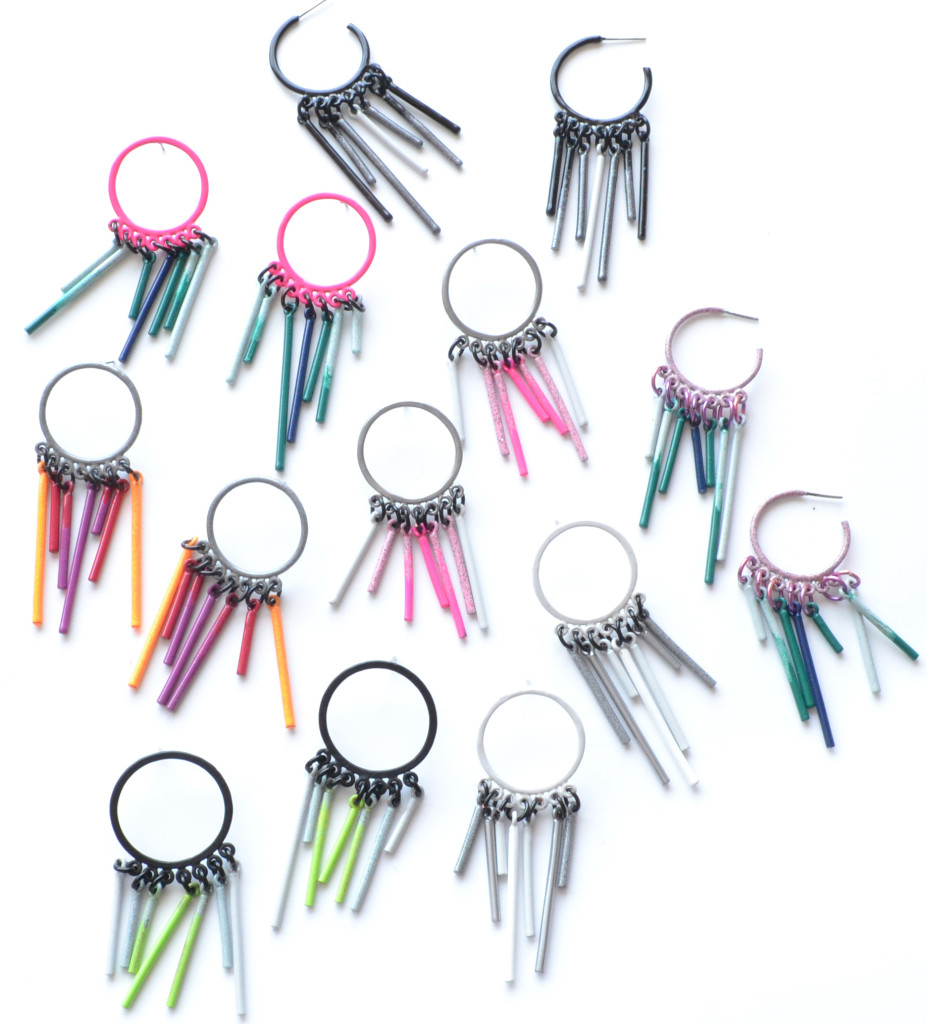 Group photo of fringe earrings powdercoated in a variety of bright colours